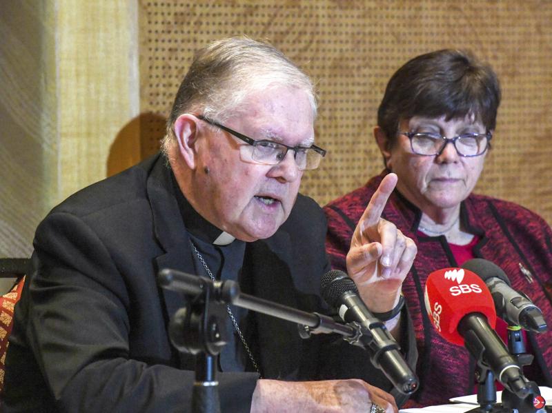 Australian Catholic Bishops Conference President Archbishop Mark Coleridge speaks to the media alongside Catholic Religious Australia President Sister Monica Cavanagh, right, during a news conference in Sydney on Friday in response to the child abuse roya Australian Catholic Bishops Conference President Archbishop Mark Coleridge speaks to the media alongside Catholic Religious Australia President Sister Monica Cavanagh, right, during a news conference in Sydney on Friday in response to the child abuse roya