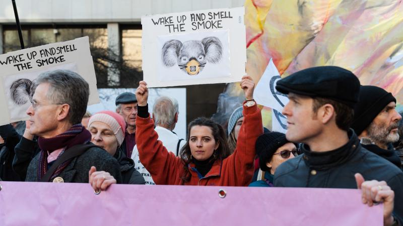 Activists protest outside the Australian Embassy in London, accusing Australia's government of inadequately responding to the fires and an overall climate emergency. Activists protest outside the Australian Embassy in London, accusing Australia's government of inadequately responding to the fires and an overall climate emergency.