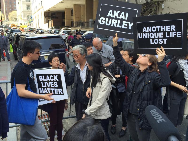 Supporters of Akai Gurley's family gather outside the courthouse where former New York City police officer Peter Liang was sentenced for Gurley's shooting death in Brooklyn, N.Y. Supporters of Akai Gurley's family gather outside the courthouse where former New York City police officer Peter Liang was sentenced for Gurley's shooting death in Brooklyn, N.Y.