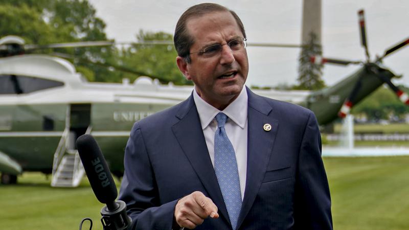 In an apparent reference to China, Health and Human Services Secretary Alex Azar says a member state of the World Health Organization "made a mockery of their transparency obligations, with tremendous costs for the entire world." Azar is seen here last we In an apparent reference to China, Health and Human Services Secretary Alex Azar says a member state of the World Health Organization "made a mockery of their transparency obligations, with tremendous costs for the entire world." Azar is seen here last we