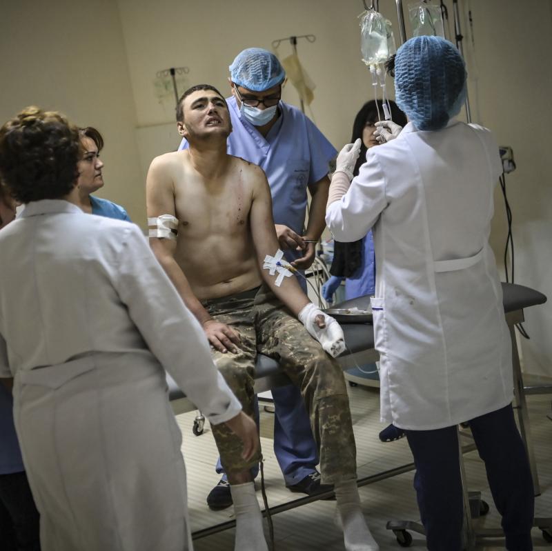 An wounded Armenian soldier getting treatment in the basement of a medical center on Wednesday outside the city of Stepanakert, in the Nagorno-Karabakh region. An wounded Armenian soldier getting treatment in the basement of a medical center on Wednesday outside the city of Stepanakert, in the Nagorno-Karabakh region.
