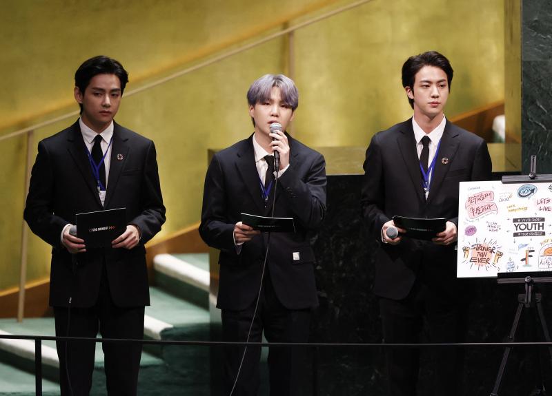 V (from left), Suga and Jin of BTS at the launch of the U.N. General Assembly's 76th session on Monday. The popular boy band from South Korea sang (in a video performance viewed online by more than 1 million) and spoke. V (from left), Suga and Jin of BTS at the launch of the U.N. General Assembly's 76th session on Monday. The popular boy band from South Korea sang (in a video performance viewed online by more than 1 million) and spoke.
