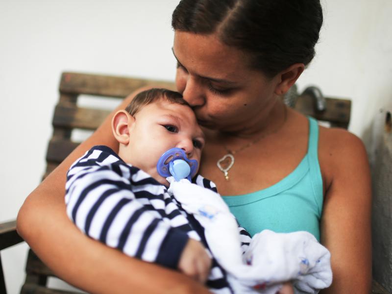 Mother Daniele Santos holds her baby Juan Pedro, who has microcephaly, on May 30, 2016, in Recife, Brazil. Researchers are now learning that Zika's effects can appear up to a year after birth. Mother Daniele Santos holds her baby Juan Pedro, who has microcephaly, on May 30, 2016, in Recife, Brazil. Researchers are now learning that Zika's effects can appear up to a year after birth.