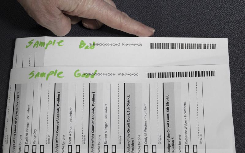 A Clackamas County election worker shows barcodes on ballots that are bad (top) and good on May 19 in Oregon City, Ore. Ballots with blurry barcodes that can't be read by vote-counting machines are delaying results in a key U.S. House race. A Clackamas County election worker shows barcodes on ballots that are bad (top) and good on May 19 in Oregon City, Ore. Ballots with blurry barcodes that can't be read by vote-counting machines are delaying results in a key U.S. House race.