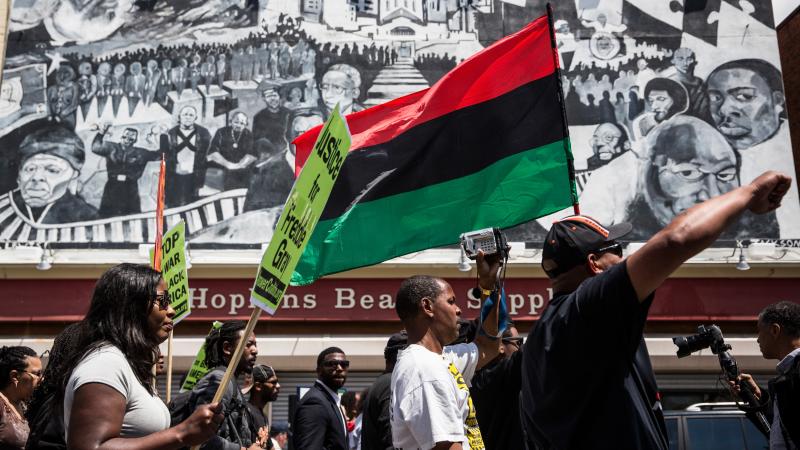 Protesters march from the Gilmor Homes, where Freddie Gray was arrested, to City Hall on Saturday in Baltimore. Protesters march from the Gilmor Homes, where Freddie Gray was arrested, to City Hall on Saturday in Baltimore.