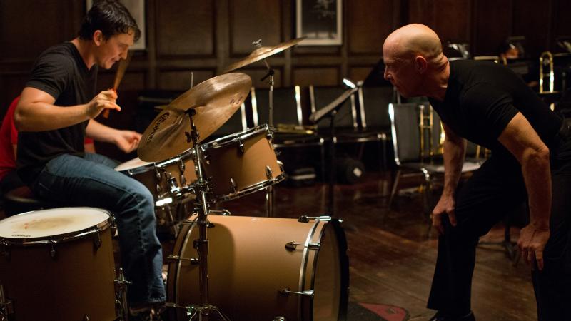Miles Teller and J.K. Simmons face off in Damien Chazelle's impressive drumming-as-sport film, Whiplash. Miles Teller and J.K. Simmons face off in Damien Chazelle's impressive drumming-as-sport film, Whiplash.