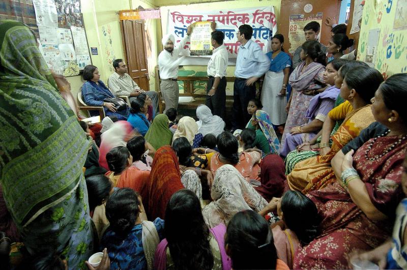 Health workers share information about tuberculosis with residents of aslum neighborhoods in New Delhi. India has the greatest number of TB cases in the world. Health workers share information about tuberculosis with residents of aslum neighborhoods in New Delhi. India has the greatest number of TB cases in the world.