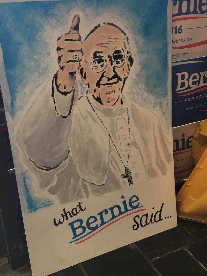 NPR's Don Gonyea spotted this poster at Bernie Sanders' Buffalo field office in New York. Sanders has often praised Pope Francis for his focus on economic inequality. NPR's Don Gonyea spotted this poster at Bernie Sanders' Buffalo field office in New York. Sanders has often praised Pope Francis for his focus on economic inequality.
