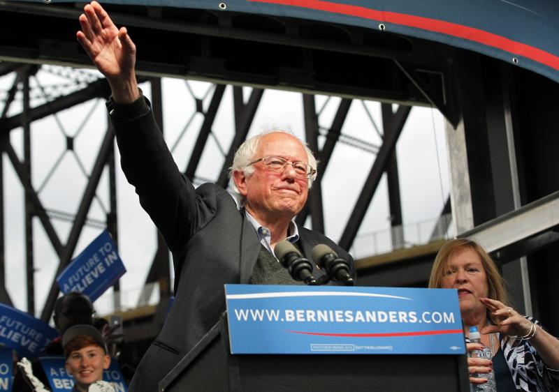 Democratic presidential candidate Bernie Sanders waves to the crowd after arriving Tuesday at a campaign rally at the Big Four Lawn Park in Louisville, Ky. Democratic presidential candidate Bernie Sanders waves to the crowd after arriving Tuesday at a campaign rally at the Big Four Lawn Park in Louisville, Ky.