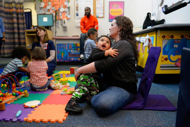 Kelly Zimmerman holds her son Jaxton Wright at a parenting session at the Children's Health Center in Reading, Pa. The free program provides resources and social support to new parents in recovery from addiction, or who are otherwise vulnerable. Kelly Zimmerman holds her son Jaxton Wright at a parenting session at the Children's Health Center in Reading, Pa. The free program provides resources and social support to new parents in recovery from addiction, or who are otherwise vulnerable.