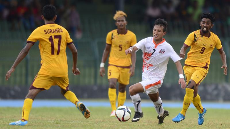 Bhutanese football player Chencho Gyeltshen controls the ball in a March 5 match against Sri Lanka. The striker hit two goals Tuesday to lead Bhutan past Sri Lanka and into the next phase of World Cup Qualifying. Bhutanese football player Chencho Gyeltshen controls the ball in a March 5 match against Sri Lanka. The striker hit two goals Tuesday to lead Bhutan past Sri Lanka and into the next phase of World Cup Qualifying.
