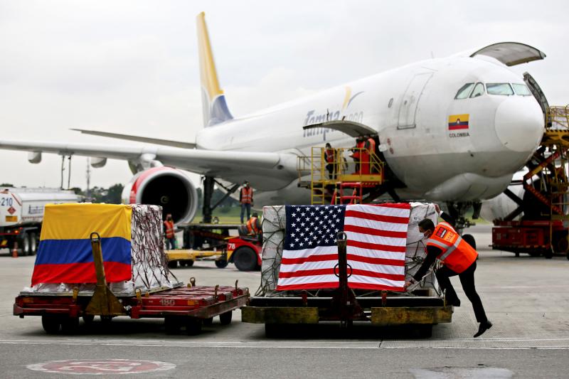 Containers of Moderna vaccines donated by the U.S. arrive last week in Bogotá, Colombia. Containers of Moderna vaccines donated by the U.S. arrive last week in Bogotá, Colombia.