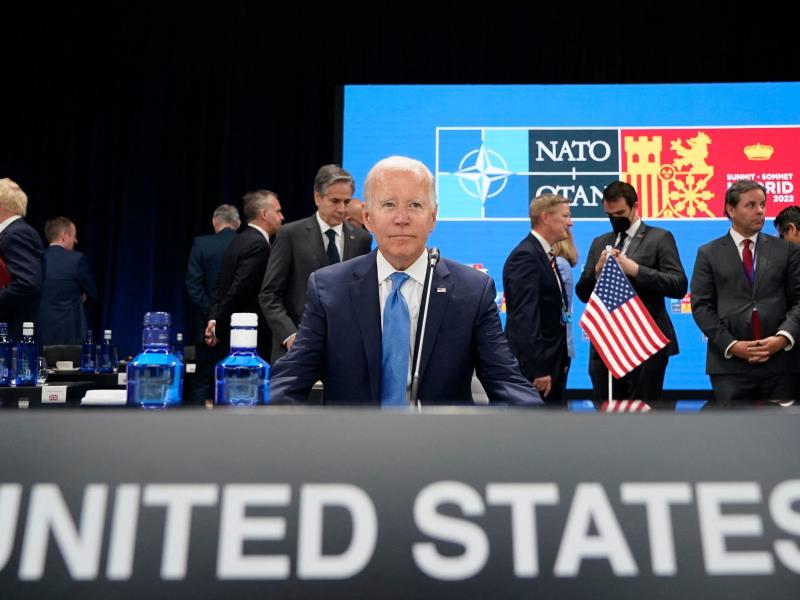 President Biden waits for the start of a roundtable meeting at the NATO summit in Madrid. He announced the U.S. would increase its military presence in Europe. President Biden waits for the start of a roundtable meeting at the NATO summit in Madrid. He announced the U.S. would increase its military presence in Europe.