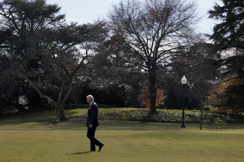 President Biden walks to Marine One outside the White House on Dec. 2. President Biden walks to Marine One outside the White House on Dec. 2.
