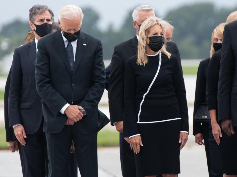 In August, President Biden attended a dignified transfer ceremony at Dover Air Force Base after 13 members of the U.S. military were killed in an attack during the chaotic withdrawal from Afghanistan. In August, President Biden attended a dignified transfer ceremony at Dover Air Force Base after 13 members of the U.S. military were killed in an attack during the chaotic withdrawal from Afghanistan.