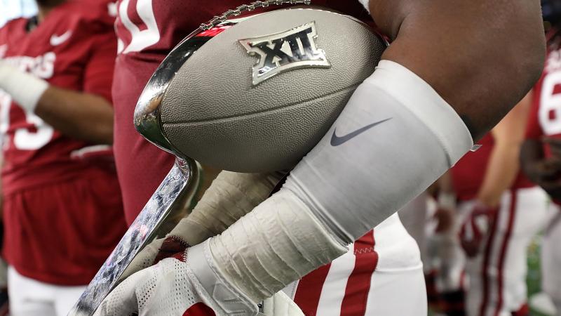 The Big 12 says its schools will start playing their conference games in late September, under a schedule that's been reduced due to the coronavirus. The conference hopes to hold a championship game in December. The Big 12 says its schools will start playing their conference games in late September, under a schedule that's been reduced due to the coronavirus. The conference hopes to hold a championship game in December.