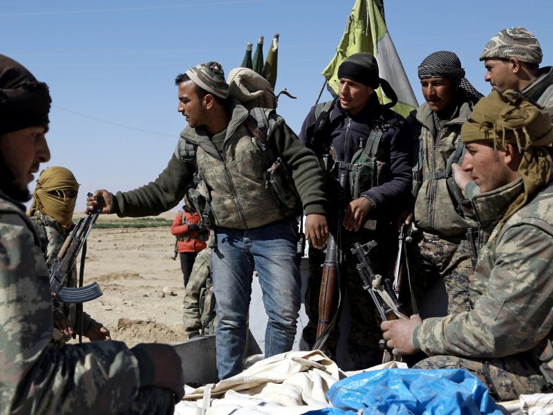 U.S.-backed Syrian Democratic Forces, made up of an alliance of Arab and Kurdish fighters, regroup on the northern outskirts of Deir Ezzor as they advance to encircle the ISIS bastion of Raqqa on Feb. 21. U.S.-backed Syrian Democratic Forces, made up of an alliance of Arab and Kurdish fighters, regroup on the northern outskirts of Deir Ezzor as they advance to encircle the ISIS bastion of Raqqa on Feb. 21.