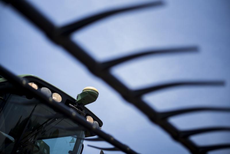 A global positioning receiver on the top of a combine harvester at a farm in Warwick, Md., in June. The equipment uses sensors and computers to help drive the combine along the route where the crops were planted, judge the composition of a crop and genera A global positioning receiver on the top of a combine harvester at a farm in Warwick, Md., in June. The equipment uses sensors and computers to help drive the combine along the route where the crops were planted, judge the composition of a crop and genera