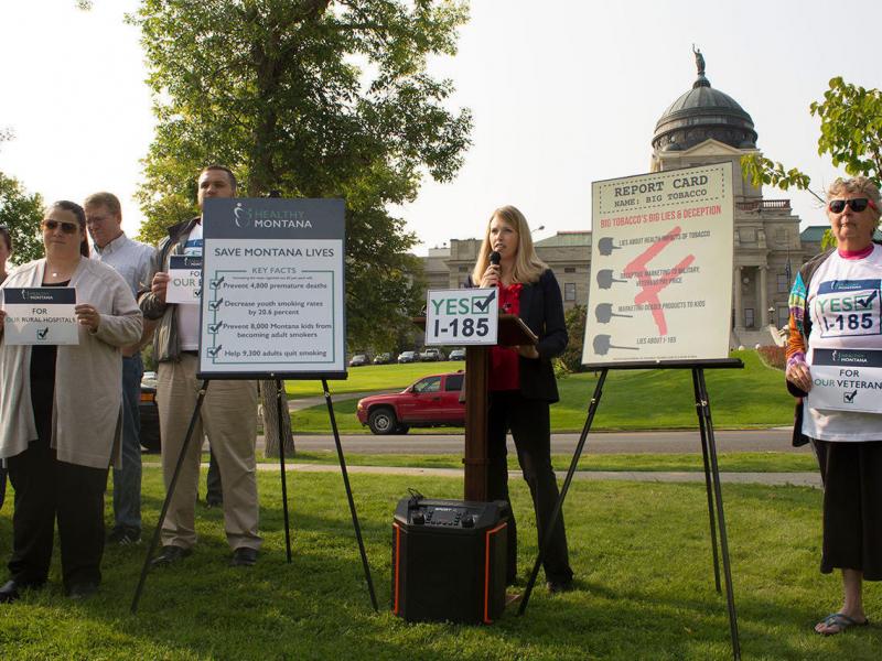 Amanda Cahill, a supporter of Montana's tobacco tax measure, I-185, at a press conference near the state capitol last August. Tobacco firms have spent $17 million in opposition to the initiative, compared to an $8 million campaign by those in favor of it. Amanda Cahill, a supporter of Montana's tobacco tax measure, I-185, at a press conference near the state capitol last August. Tobacco firms have spent $17 million in opposition to the initiative, compared to an $8 million campaign by those in favor of it.