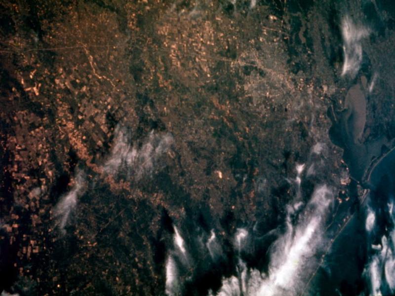 View of the Texas Gulf Coast (from Houston to Beaumont) taken in 1969 from space during the Apollo 9 mission. View of the Texas Gulf Coast (from Houston to Beaumont) taken in 1969 from space during the Apollo 9 mission.