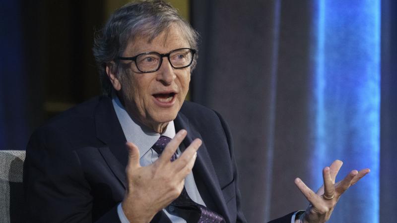 Microsoft co-founder Bill Gates, seen above in 2018, gives high marks for social distancing efforts during the coronavirus pandemic but low marks for testing. He says he thinks large public gatherings may have to wait until there's a vaccine. Microsoft co-founder Bill Gates, seen above in 2018, gives high marks for social distancing efforts during the coronavirus pandemic but low marks for testing. He says he thinks large public gatherings may have to wait until there's a vaccine.