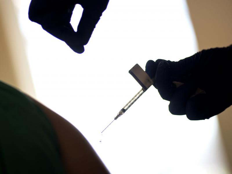 A droplet falls from a syringe after a health care worker was injected with the Pfizer-BioNTech COVID-19 vaccine at Women & Infants Hospital in Providence, R.I. A droplet falls from a syringe after a health care worker was injected with the Pfizer-BioNTech COVID-19 vaccine at Women & Infants Hospital in Providence, R.I.