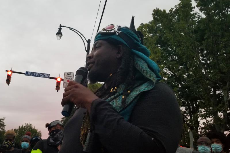 Poet and activist Christopher Coles addresses a crowd in Rochester, N.Y. His message to white protesters is a reminder: "For some of you all that come here, you come because it's an elective. We come because it's survival." Poet and activist Christopher Coles addresses a crowd in Rochester, N.Y. His message to white protesters is a reminder: "For some of you all that come here, you come because it's an elective. We come because it's survival."
