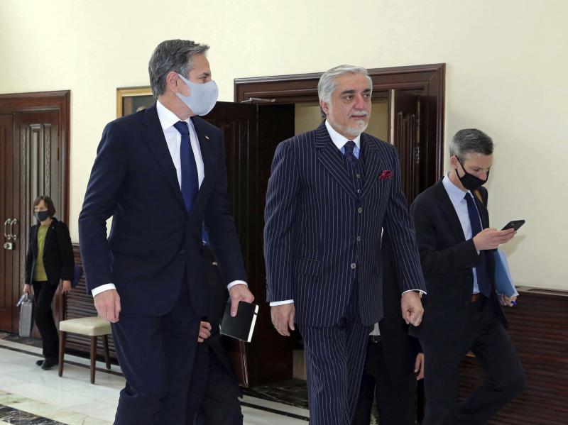 Abdullah Abdullah (center), chairman of the High Council for National Reconciliation, accompanies U.S. Secretary of State Antony Blinken at the Sapidar Palace in Kabul, Afghanistan, on Thursday. Abdullah Abdullah (center), chairman of the High Council for National Reconciliation, accompanies U.S. Secretary of State Antony Blinken at the Sapidar Palace in Kabul, Afghanistan, on Thursday.