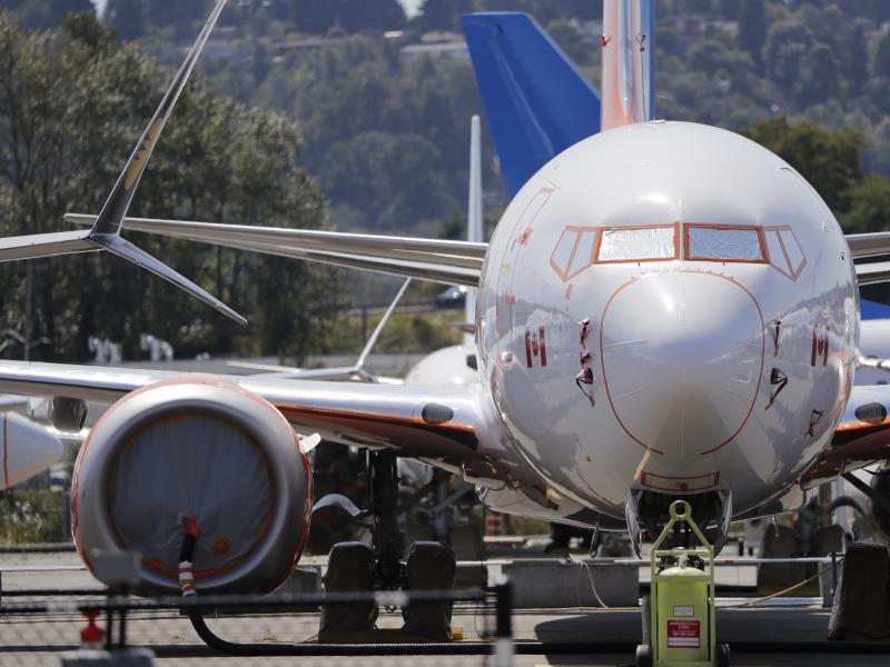 A grounded Boeing 737 Max sits in a parking area adjacent to Boeing Field in Seattle. Federal safety officials said on Thursday that Boeing should consider how cockpit confusion can slow the response time of pilots. A grounded Boeing 737 Max sits in a parking area adjacent to Boeing Field in Seattle. Federal safety officials said on Thursday that Boeing should consider how cockpit confusion can slow the response time of pilots.