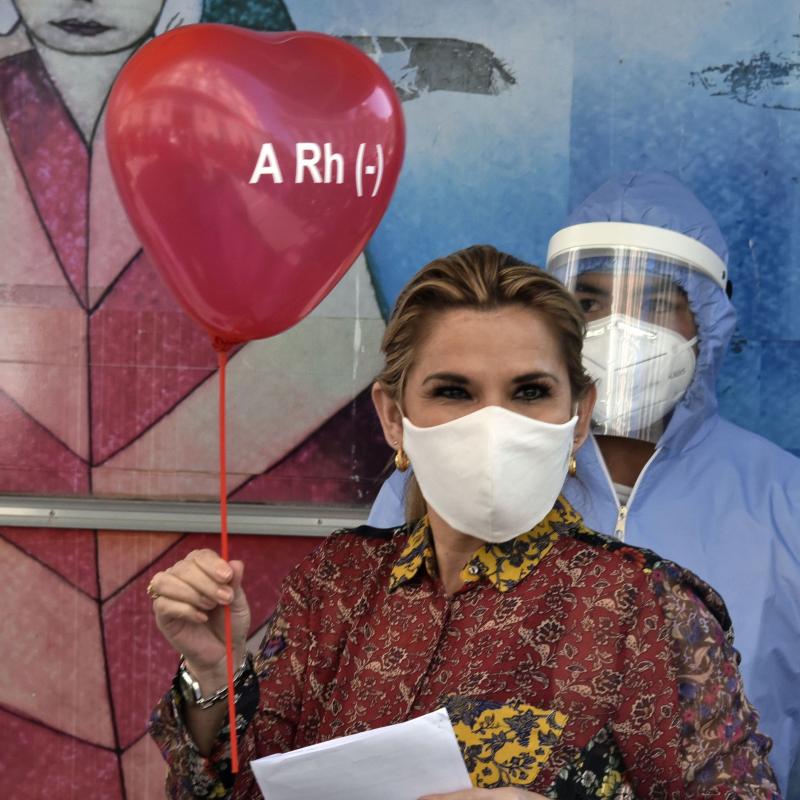 Bolivian President Jeanine Áñez is pictured before donating blood at the presidential palace in La Paz last month amid the COVID-19 pandemic. Bolivian President Jeanine Áñez is pictured before donating blood at the presidential palace in La Paz last month amid the COVID-19 pandemic.