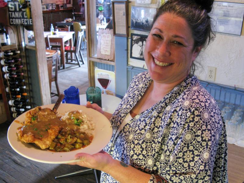 Hilltop waitress Kayla Young serves up one of the Zagat-rated restaurant's dishes, chicken-fried steak. Hilltop waitress Kayla Young serves up one of the Zagat-rated restaurant's dishes, chicken-fried steak.