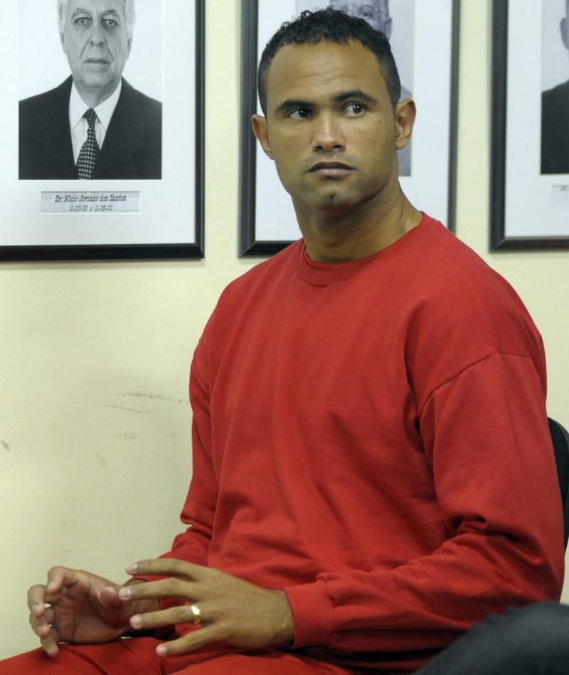 Former star goalie Bruno Fernandes de Souza, shown in 2012 at his murder trial in Contagem, Brazil, was convicted of ordering his ex-girlfriend's death. He was recently released on a technicality and has been signed by another professional soccer team. Former star goalie Bruno Fernandes de Souza, shown in 2012 at his murder trial in Contagem, Brazil, was convicted of ordering his ex-girlfriend's death. He was recently released on a technicality and has been signed by another professional soccer team.
