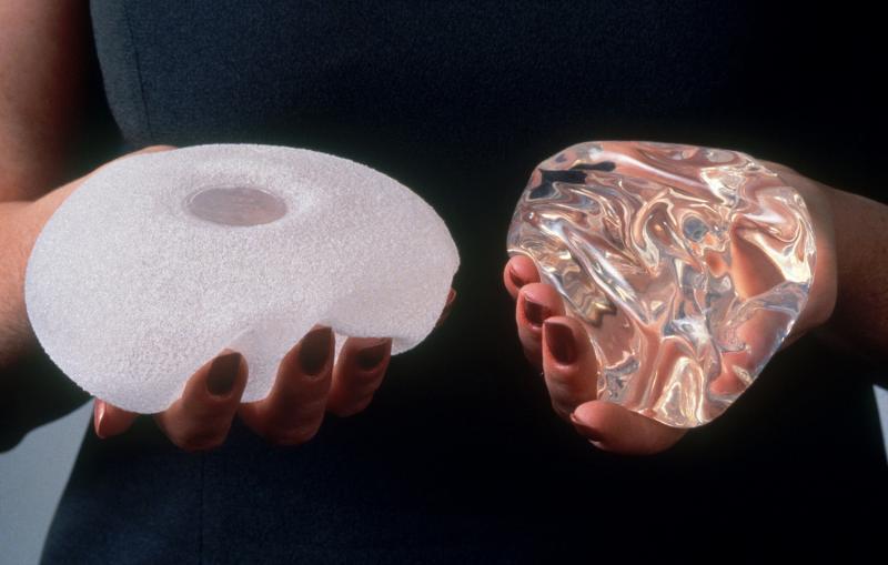 A textured breast implant, left, and a smooth breast implant. A textured breast implant, left, and a smooth breast implant.