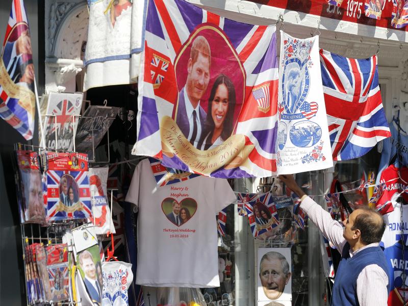 A souvenir shop in Windsor, England, sells wedding-themed T-shirts and other memorabilia ahead of Saturday's royal wedding. A souvenir shop in Windsor, England, sells wedding-themed T-shirts and other memorabilia ahead of Saturday's royal wedding.