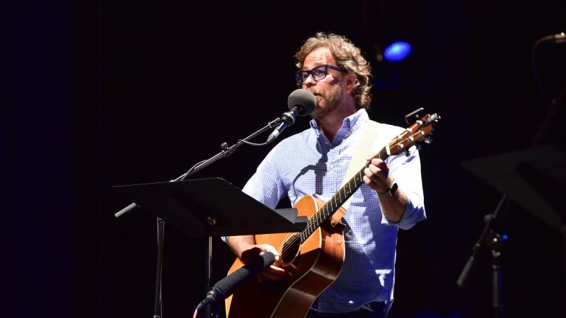 Ask Me Another house musician Jonathan Coulton performs at the Majestic Theatre in Dallas, Texas. Ask Me Another house musician Jonathan Coulton performs at the Majestic Theatre in Dallas, Texas.