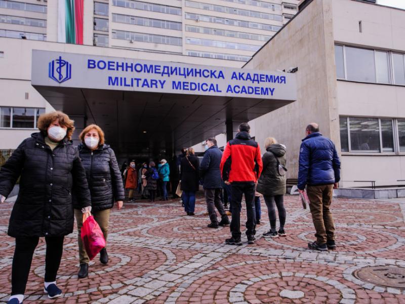 People wait in front of the hospital of the Military Medical Academy in Sofia, Bulgaria, on Feb. 21 for a COVID-19 vaccination. People wait in front of the hospital of the Military Medical Academy in Sofia, Bulgaria, on Feb. 21 for a COVID-19 vaccination.