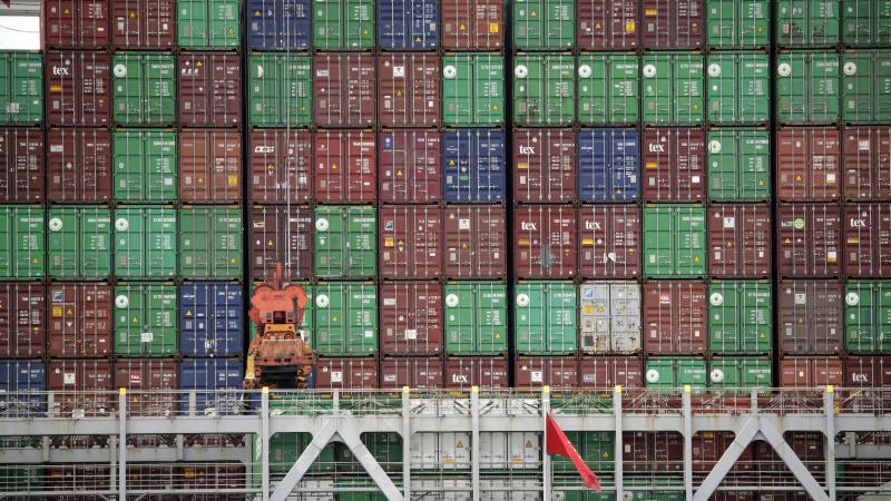 Cargo containers are stacked on a ship at California's Port of Los Angeles. Consumer goods are arriving from China and elsewhere, but a lot is not getting to its destination. Cargo containers are stacked on a ship at California's Port of Los Angeles. Consumer goods are arriving from China and elsewhere, but a lot is not getting to its destination.