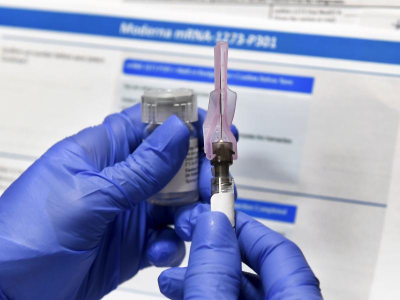 A COVID-19 vaccine developed by Moderna Inc. and the National Institutes of Health, shown here, is one of three vaccines in Phase 3 trials in the U.S. With development and testing underway, health officials are asking states to prepare for limited distrib A COVID-19 vaccine developed by Moderna Inc. and the National Institutes of Health, shown here, is one of three vaccines in Phase 3 trials in the U.S. With development and testing underway, health officials are asking states to prepare for limited distrib