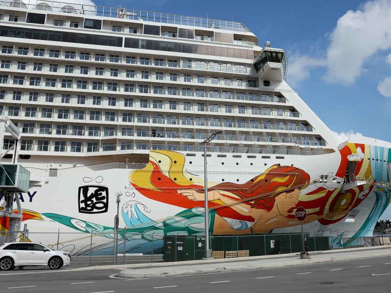 The Norwegian Gateway cruise ship is moored at PortMiami on Jan. 7 in Miami. The Centers for Disease Control and Prevention dropped its advisory warning Wednesday for cruise travel after more than two years of warning Americans. The Norwegian Gateway cruise ship is moored at PortMiami on Jan. 7 in Miami. The Centers for Disease Control and Prevention dropped its advisory warning Wednesday for cruise travel after more than two years of warning Americans.