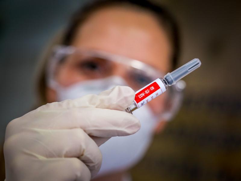 A nurse holds a COVID-19 vaccine candidate produced by Chinese company Sinovac Biotech at the São Lucas Hospital in Porto Alegre, Brazil, on Aug. 8. A nurse holds a COVID-19 vaccine candidate produced by Chinese company Sinovac Biotech at the São Lucas Hospital in Porto Alegre, Brazil, on Aug. 8.