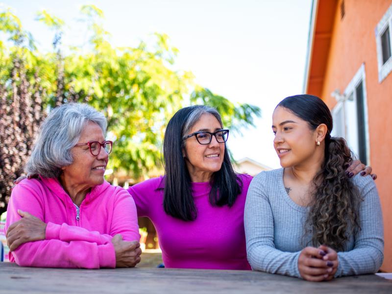 Three generations, (from left to right) grandmother Genoveva Calloway, daughter Petra Gonzales, and granddaughter Vanesa Quintero, live next door to each other in San Pablo, Calif. Recently their extended family was hit with a second wave of COVID infecti Three generations, (from left to right) grandmother Genoveva Calloway, daughter Petra Gonzales, and granddaughter Vanesa Quintero, live next door to each other in San Pablo, Calif. Recently their extended family was hit with a second wave of COVID infecti