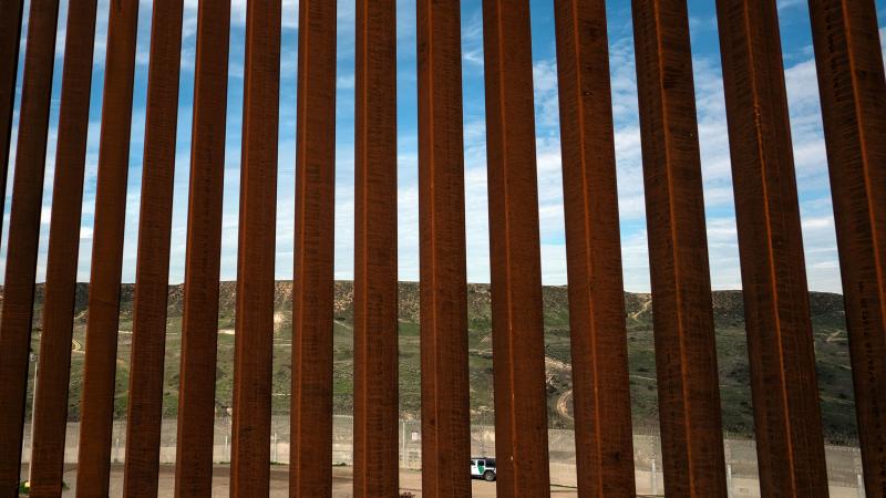 A section of the U.S.-Mexico border fence as seen from Tijuana, Mexico. California's governor plans to split his state's National Guard troops on the border into three new deployments. A section of the U.S.-Mexico border fence as seen from Tijuana, Mexico. California's governor plans to split his state's National Guard troops on the border into three new deployments.