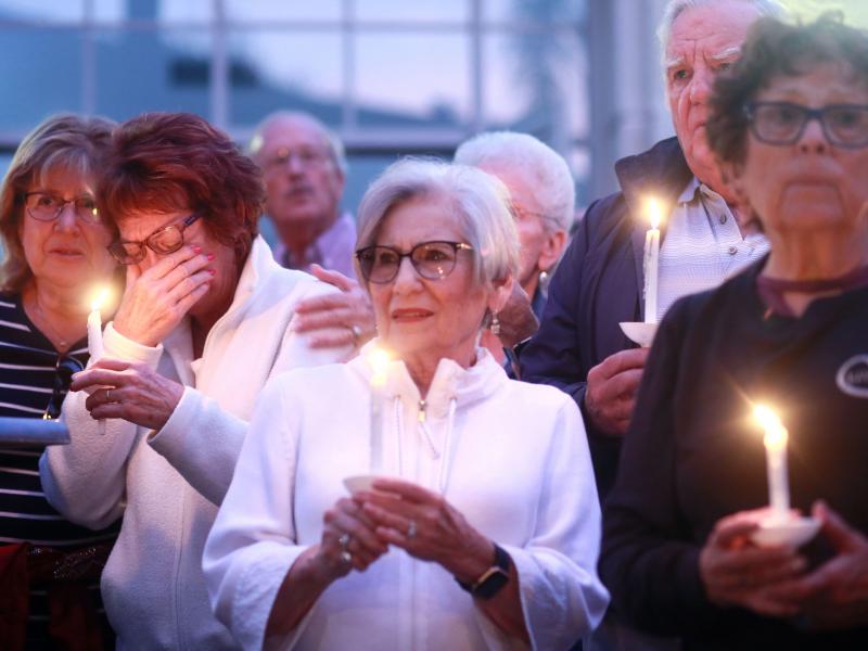 Mourners participate in a candle light vigil for the victims of the Chabad of Poway Synagogue shooting at the Rancho Bernardo Community Presbyterian Church on April 27, 2019 in Poway, Calif. Mourners participate in a candle light vigil for the victims of the Chabad of Poway Synagogue shooting at the Rancho Bernardo Community Presbyterian Church on April 27, 2019 in Poway, Calif.