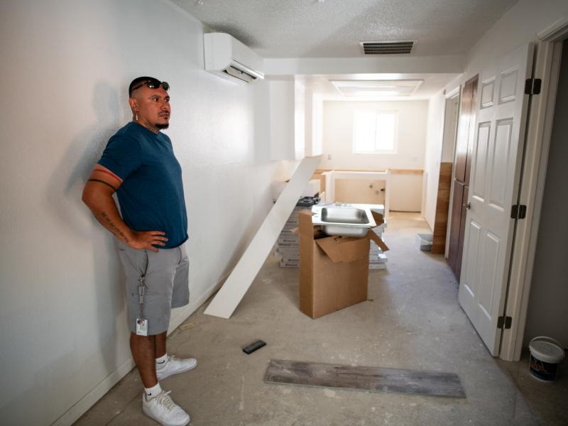 Joshua Ray, a social worker with the Scotts Valley Band of Pomo Indians, inside one of the apartments of the building tribal leaders bought in Lakeport, Calif., through Homekey. Joshua Ray, a social worker with the Scotts Valley Band of Pomo Indians, inside one of the apartments of the building tribal leaders bought in Lakeport, Calif., through Homekey.