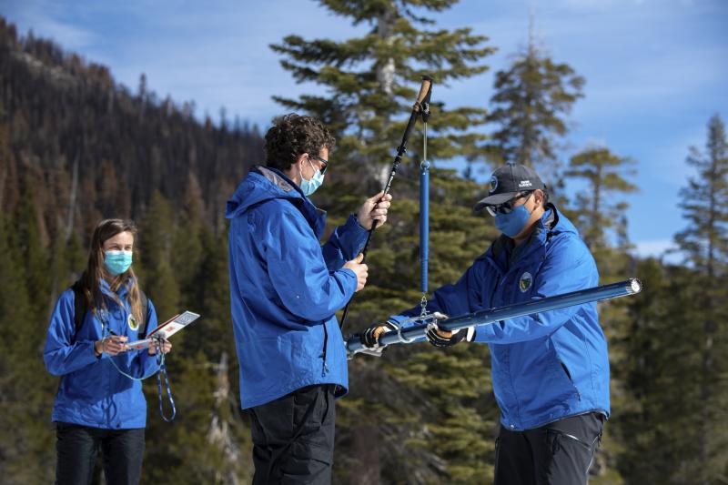 Lauren Alkire (from left), Nick Ellis and Sean de Guzman, manager of snow surveys and water supply forecasting unit, conduct the third snow survey of the season at Phillips Station near Echo Summit, Calif., on March 1. Lauren Alkire (from left), Nick Ellis and Sean de Guzman, manager of snow surveys and water supply forecasting unit, conduct the third snow survey of the season at Phillips Station near Echo Summit, Calif., on March 1.