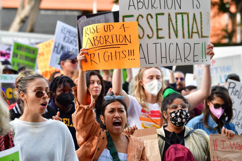 Protesters gather outside the U.S. Courthouse in Los Angeles to defend abortion rights on May 3, 2022, after a Supreme Court opinion overturning Roe v. Wade was leaked. Protesters gather outside the U.S. Courthouse in Los Angeles to defend abortion rights on May 3, 2022, after a Supreme Court opinion overturning Roe v. Wade was leaked.
