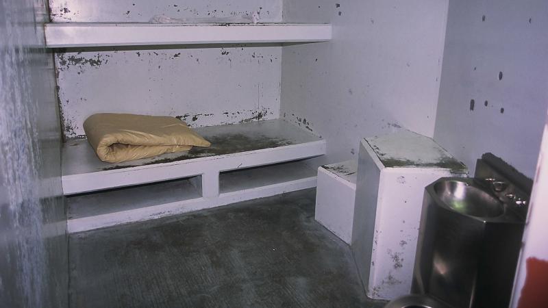 California has agreed to revise its rules on solitary confinement. This file photo shows a cell in the Secure Housing Unit of Pelican Bay State Prison in Crescent City, California. California has agreed to revise its rules on solitary confinement. This file photo shows a cell in the Secure Housing Unit of Pelican Bay State Prison in Crescent City, California.