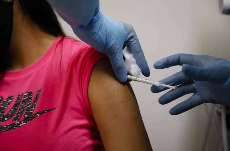 A volunteer received an injection as part of a clinical trial for a COVID-19 vaccine at Research Centers of America in Hollywood, Fla. Studies of vaccines backed by Operation Warp Speed have enrolled tens of thousands of people in a matter of months. A volunteer received an injection as part of a clinical trial for a COVID-19 vaccine at Research Centers of America in Hollywood, Fla. Studies of vaccines backed by Operation Warp Speed have enrolled tens of thousands of people in a matter of months.