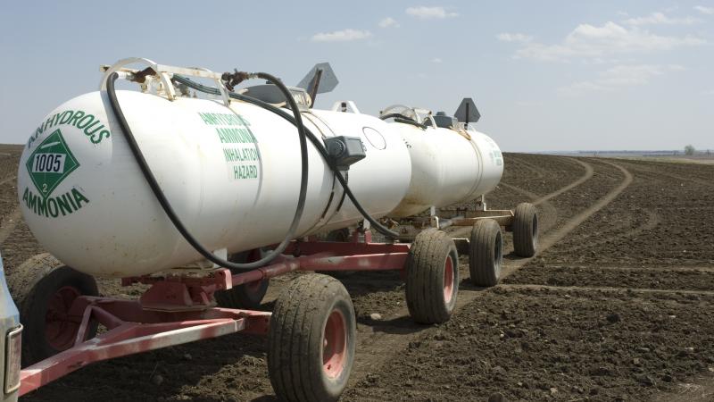Anhydrous ammonia tanks in a newly planted wheat field. Walmart has promised big cuts in emissions of greenhouse gases. To meet that goal, though, the giant retailer may have to persuade farmers to use less fertilizer. It won't be easy. Anhydrous ammonia tanks in a newly planted wheat field. Walmart has promised big cuts in emissions of greenhouse gases. To meet that goal, though, the giant retailer may have to persuade farmers to use less fertilizer. It won't be easy.