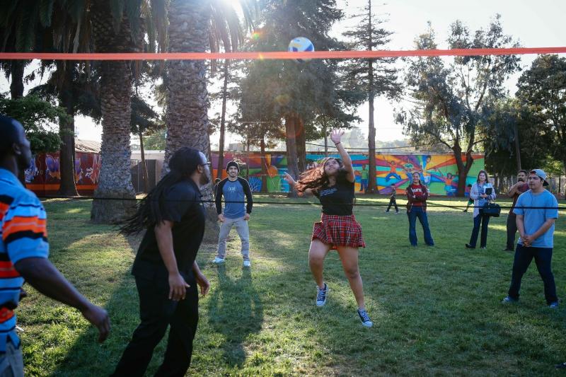 In a FIT zone at Bell Street Park in East Palo Alto, Calif., friends from the neighborhood now gather regularly to play volleyball. In a FIT zone at Bell Street Park in East Palo Alto, Calif., friends from the neighborhood now gather regularly to play volleyball.